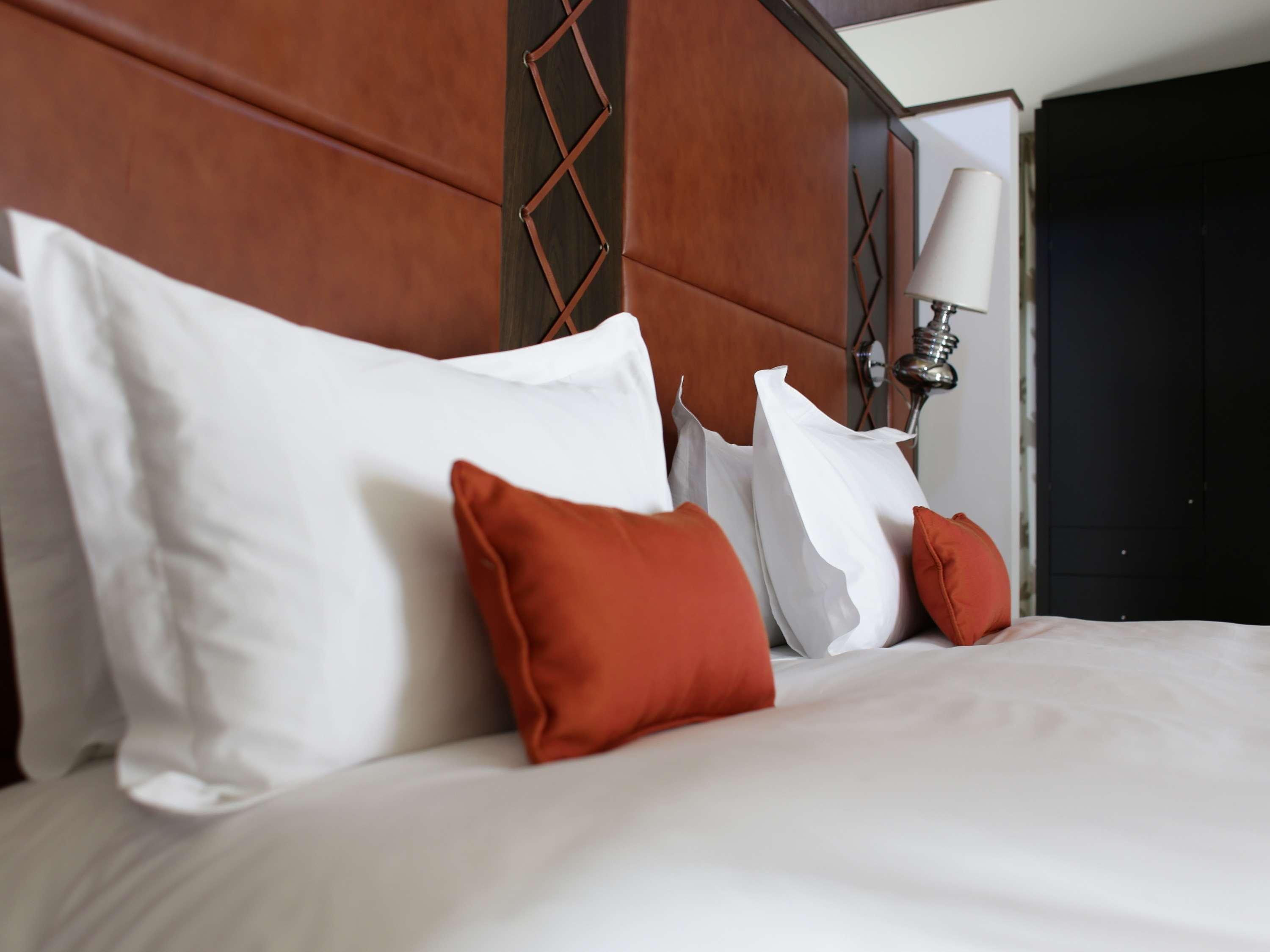 Sofitel Montevideo Casino Carrasco & Spa Exterior photo A bed with pillows