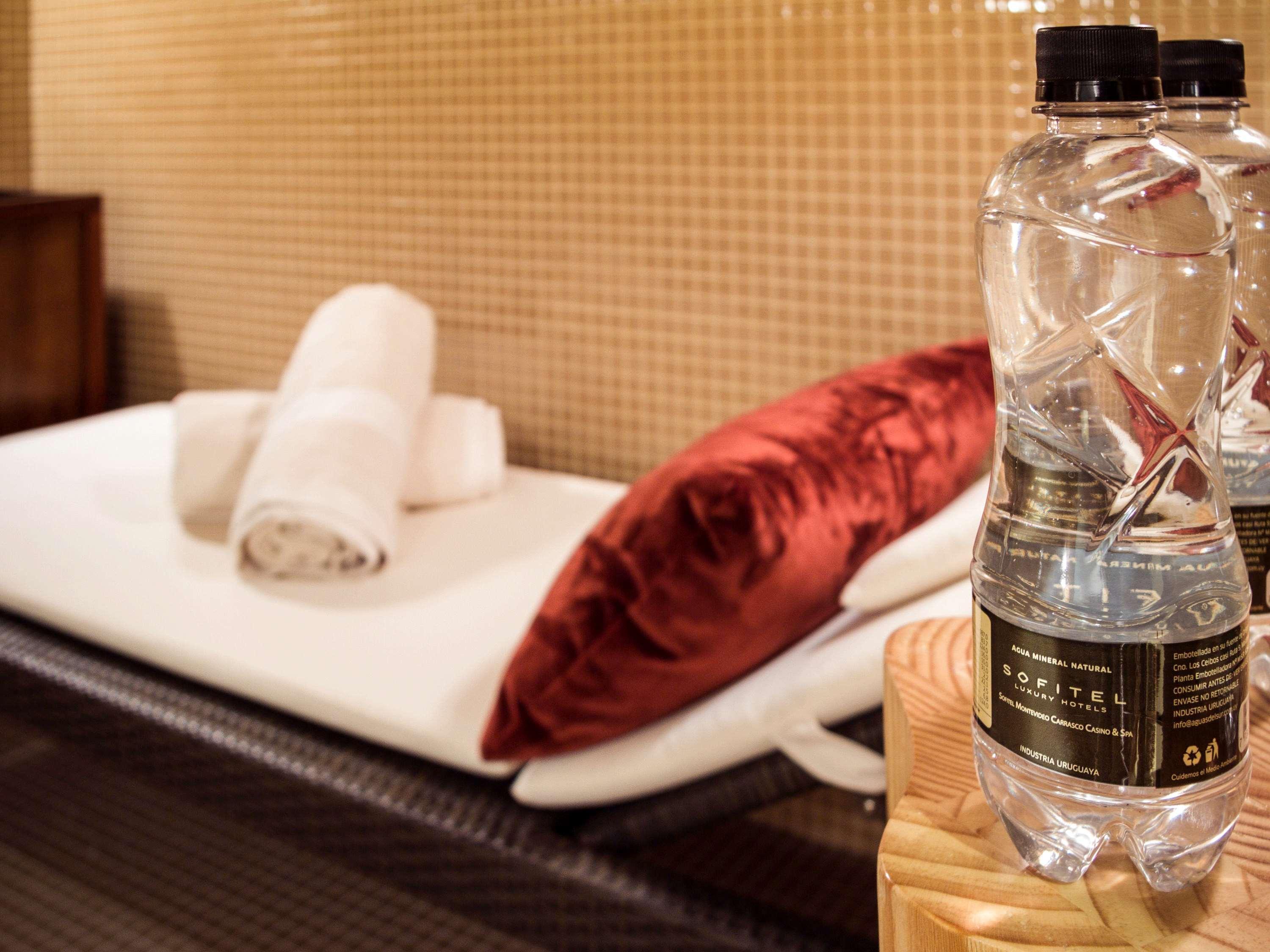 Sofitel Montevideo Casino Carrasco & Spa Exterior photo Bottled water in a hotel room